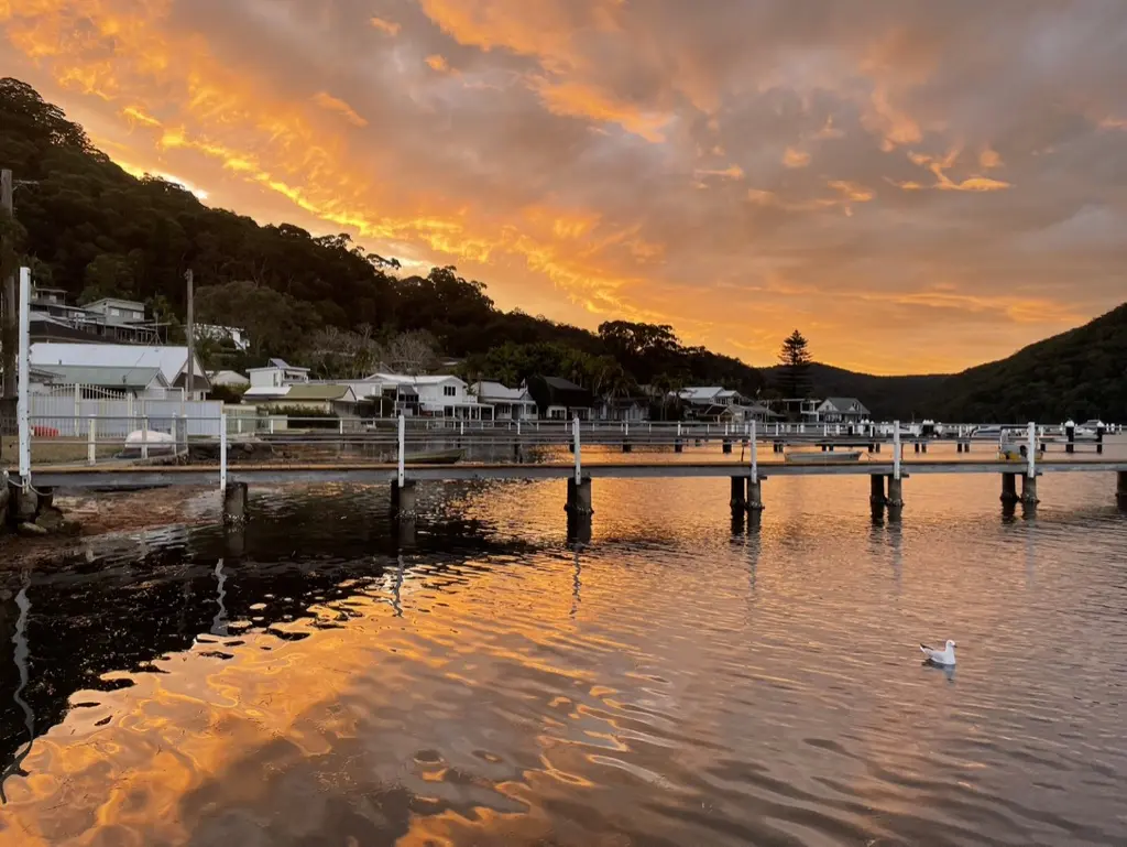 Golden sunset across the Woy Woy Bay waterfront